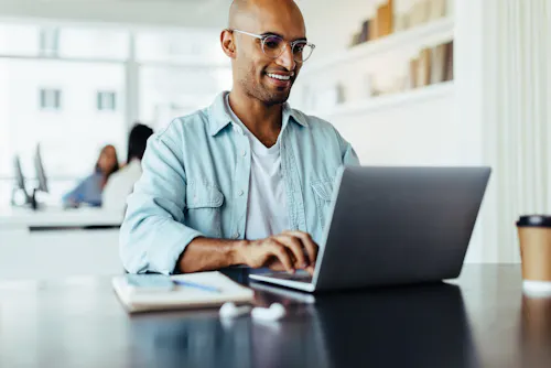 Man in glasses learning