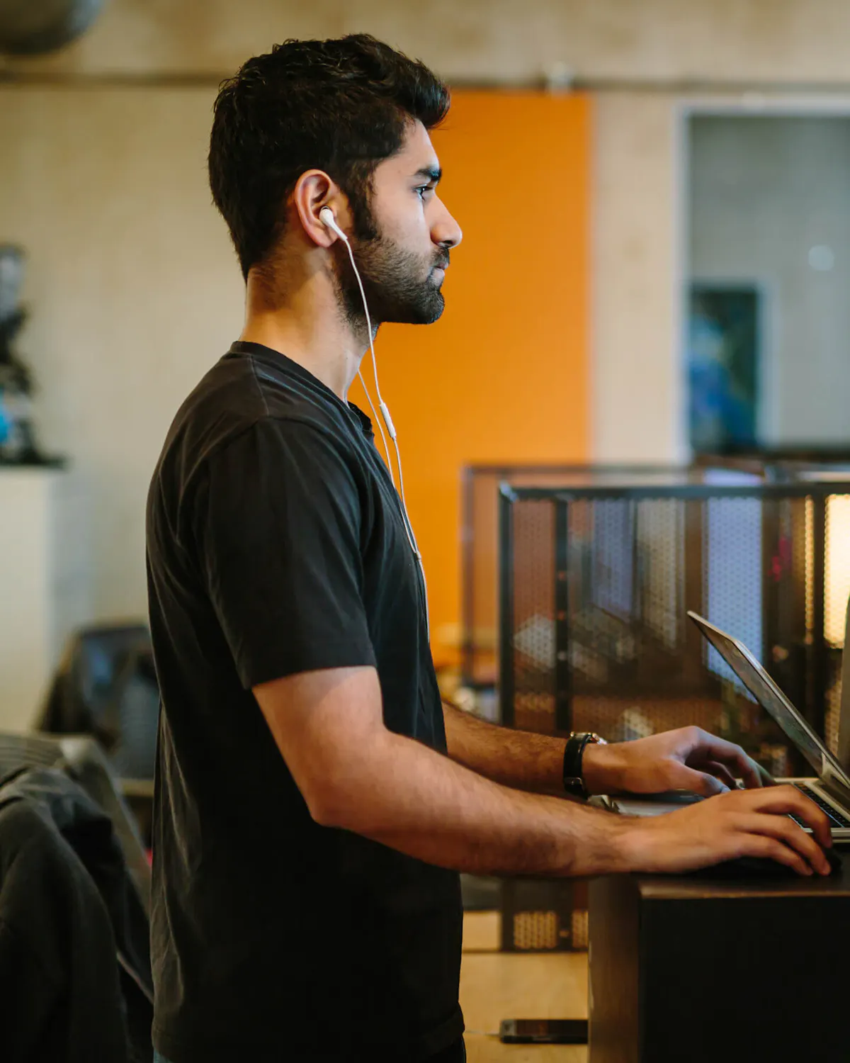 Man at standing desk vertical