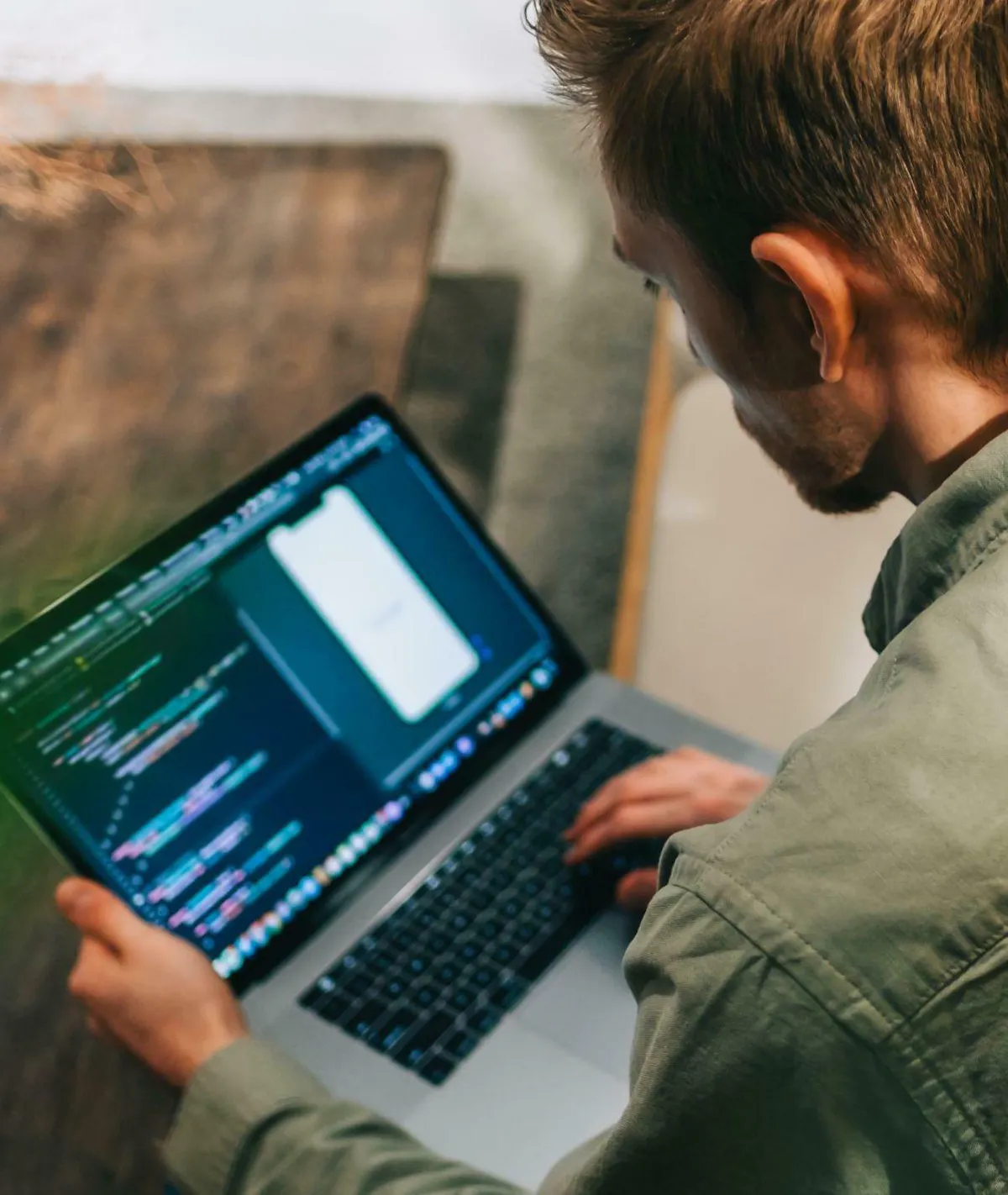 Man looking at a coding screen