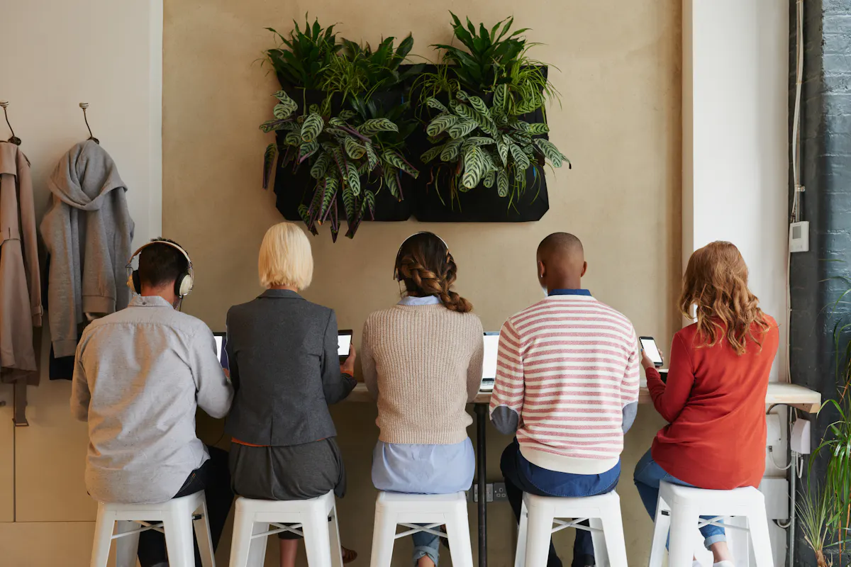 People sitting on stools reverse