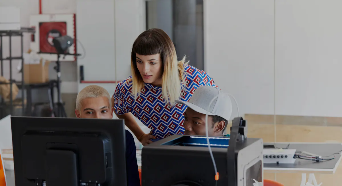 Woman leaning in over monitor