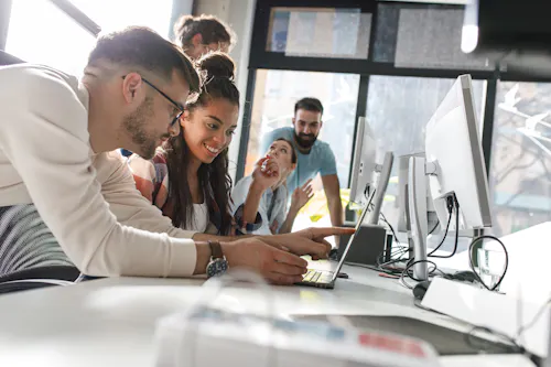 Group working at laptop together