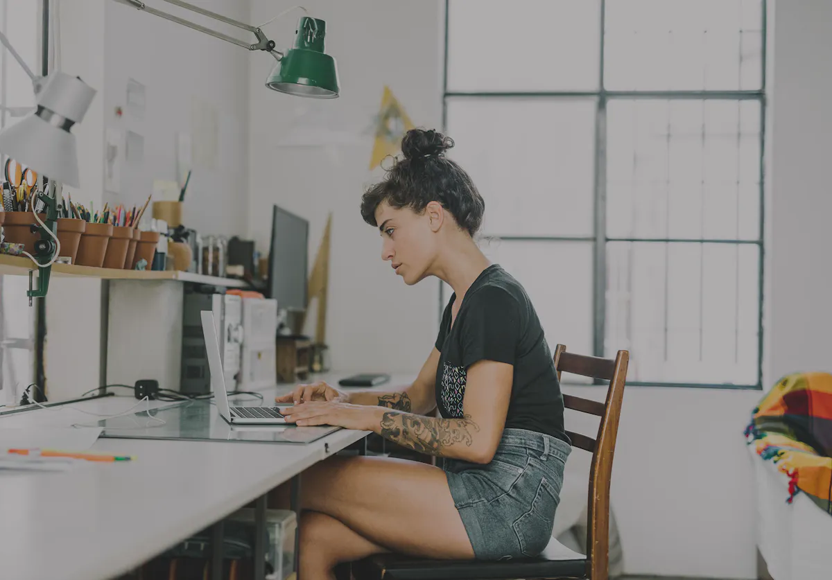 Woman working at art desk